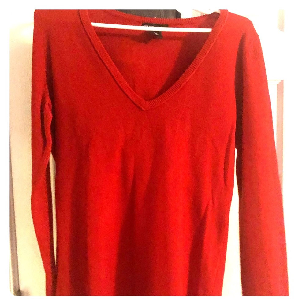 2 v-neck sweaters.